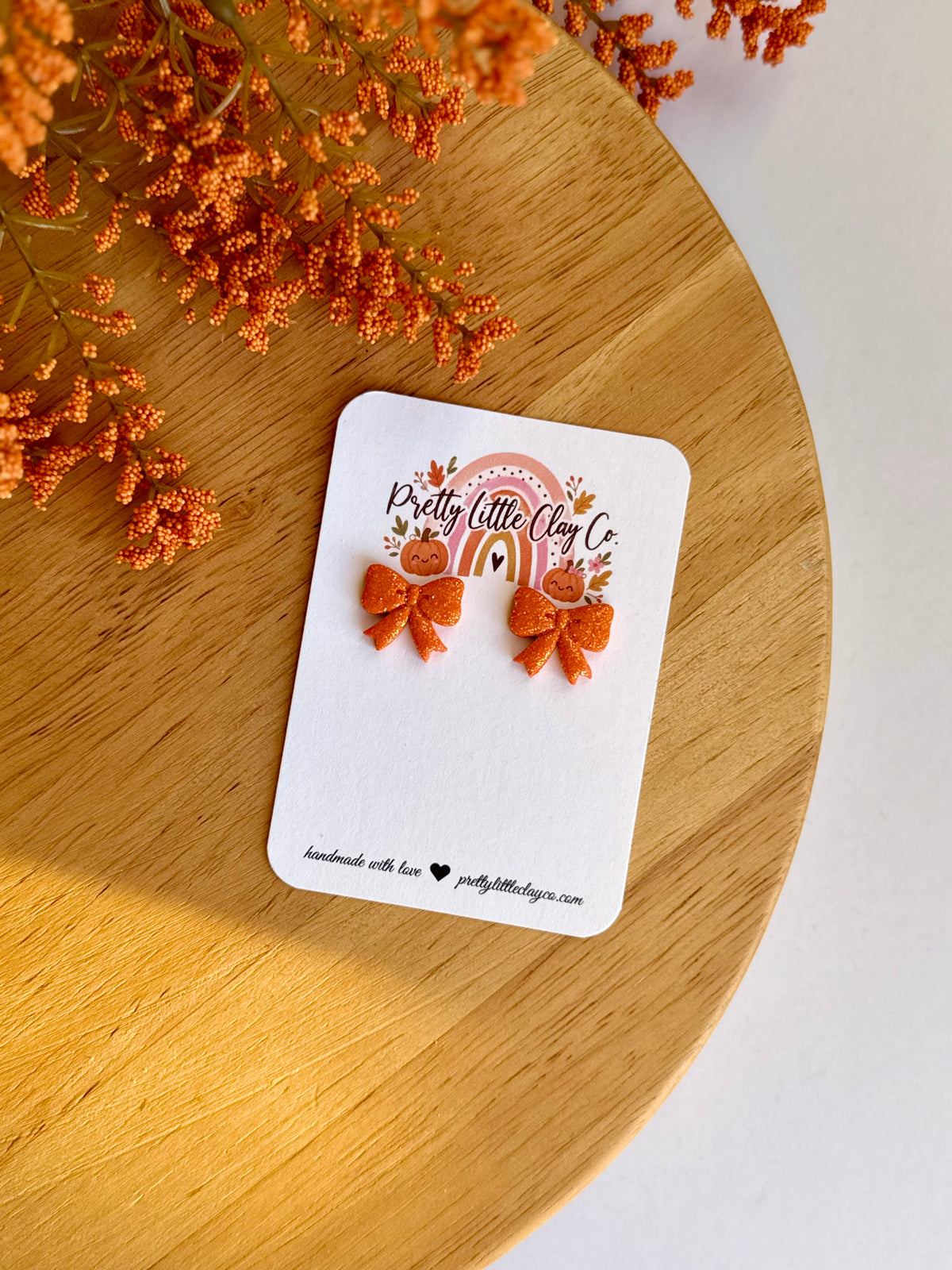 Sparkly Bow Studs (orange)